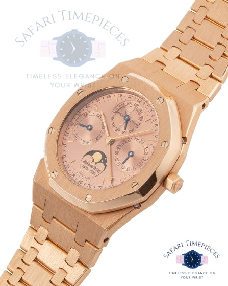 Rose gold watch with detailed face on a light beige background, branded 'Safari Timepieces'.