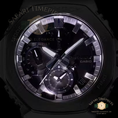 Black Casio watch with intricate design on a dark background