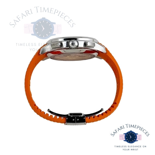Watch with orange strap and silver case on a white background, branded 'Safari Timepieces'.