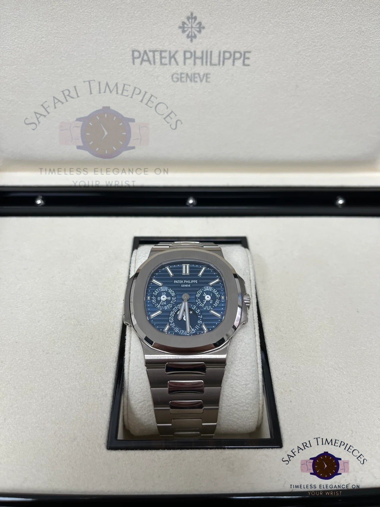 Patek Philippe watch in a box with 'Safari Timepieces' branding.
