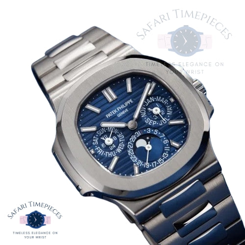 Luxury watch with blue face and silver case on a white background, branded 'Safari Timepieces'.