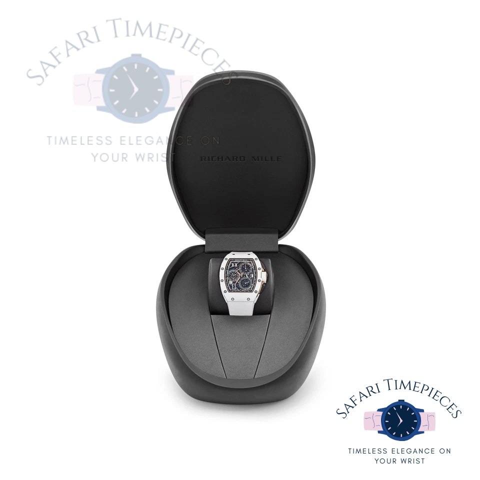 Watch in a black display case with 'Richard Mille' branding on a white background.