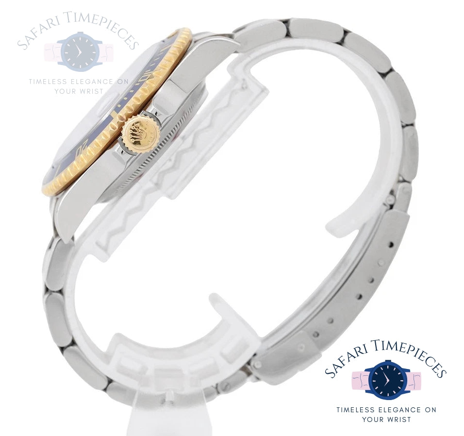 Watch band with gold and silver design on a white background, featuring 'Safari Timepieces' branding.