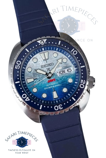Blue Seiko watch with a detailed face on a white background