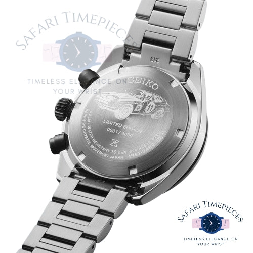 Close-up of a Seiko watch with engraved details on a white background
