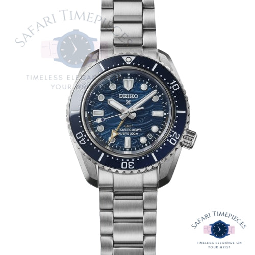 Seiko watch with blue dial and silver bracelet on a white background