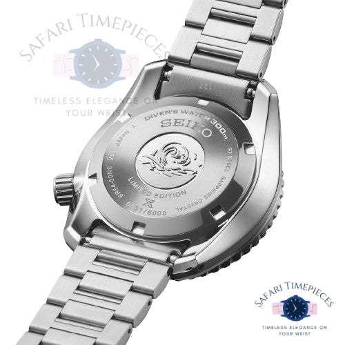 Silver Seiko watch with brand logo on a white background