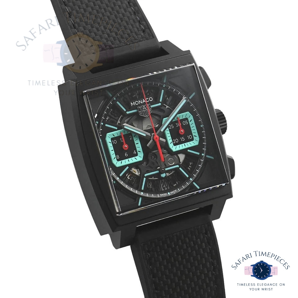 Black Tag Heuer Monaco Skeleton watch with a detailed face on a white background