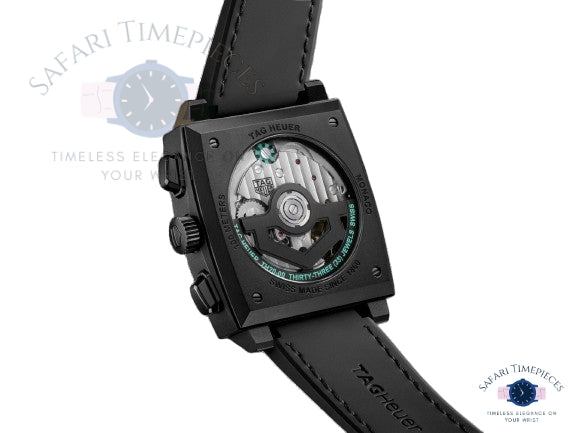 Black Tag Heuer Monaco Skeleton watch with visible brand logo on a white background