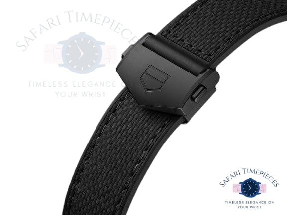 Close-up of a black Tag Heuer Monaco Skeleton watch strap with a clasp on a white background, featuring 'Safari Timepieces' branding.